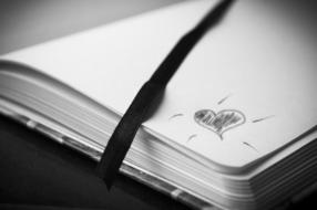 heart is drawn in a notebook