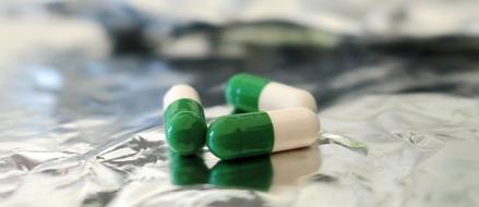 green and white capsule
