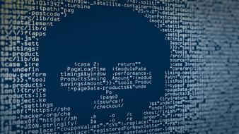 skull shape with malicious code, hacker