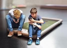 fantastic photo of guys sitting on an iPhone