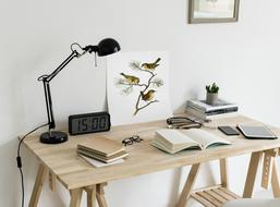 desk with electronic clock in the room