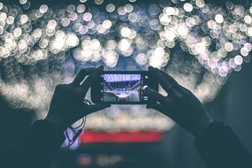 taking picture of illuminated street