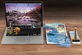 realistic landscapes on the screens of laptop, tablet and smartphone