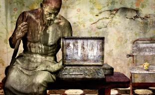 fantastic image of stone man and laptop