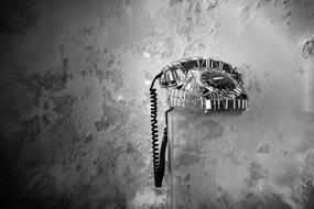 Telephone Handset grey wall