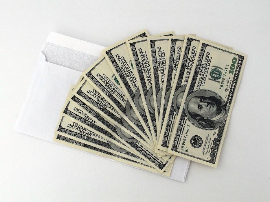 Dollar bills on Envelope, bribe