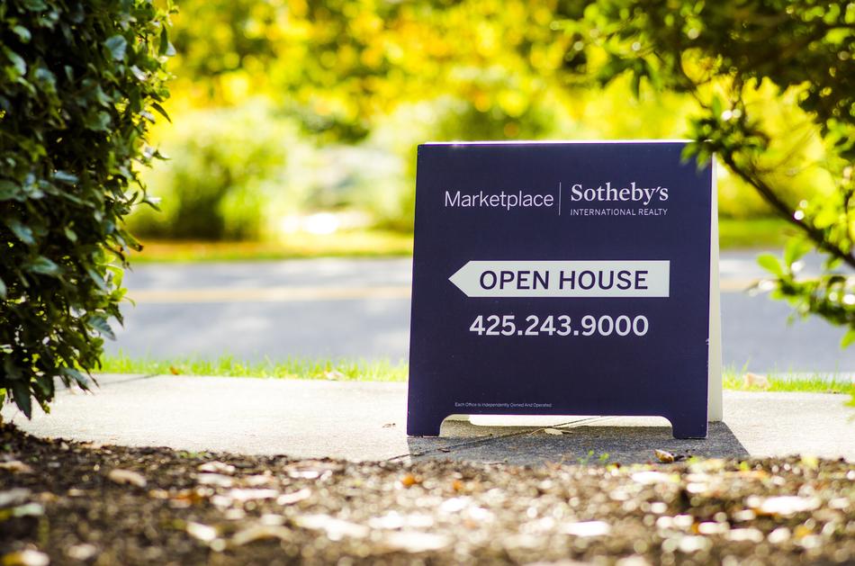 'Open House' Sign among the plants
