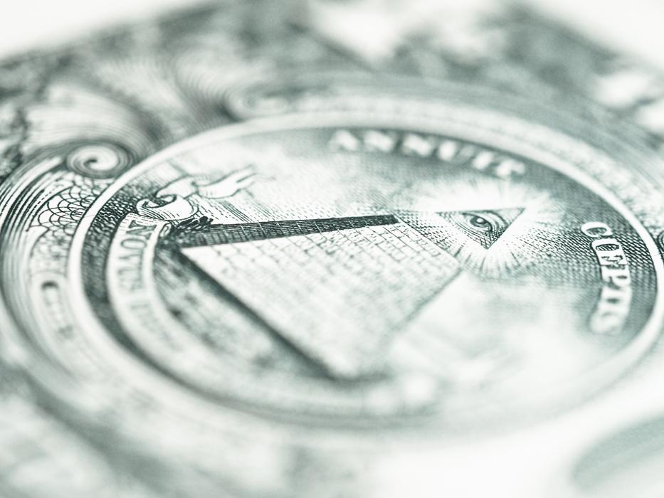 pyramid on dollar bills close up