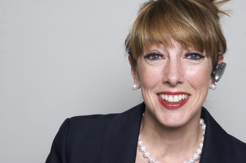 portrait photo of woman with handsfree earphone