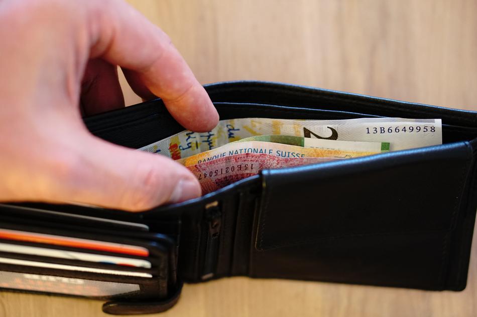 leather wallet with money close-up