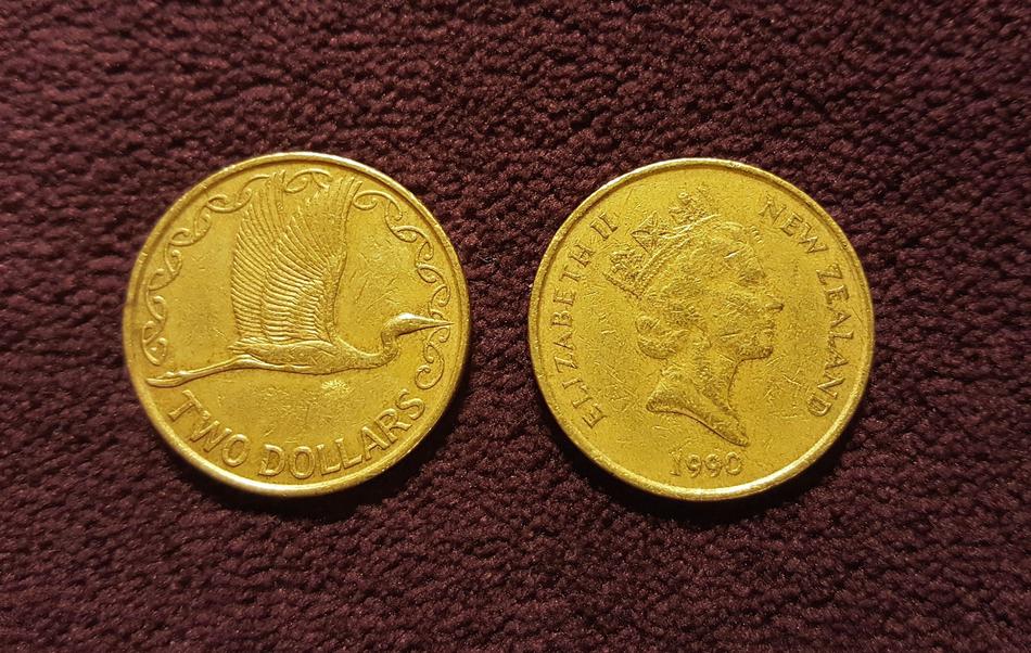 gold coins with a image of the queen