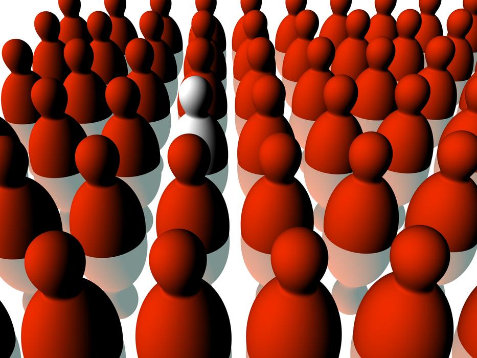 White 3d figure among the red 3d figures on the shiny surface