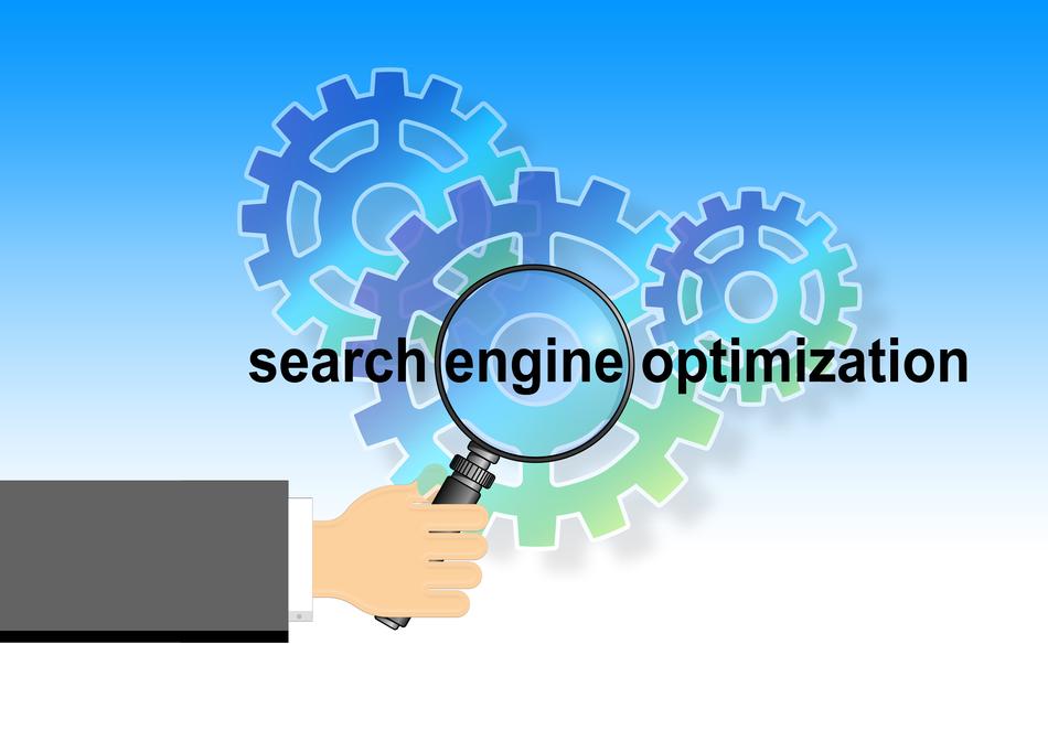 magnifying glass and gears