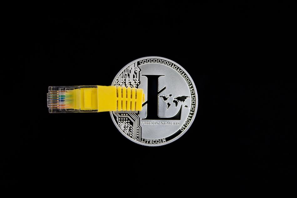 Beautiful, metallic and black 'Litecoin' sign, at black background, clipart