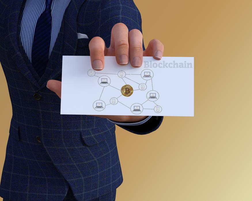 block chain in the hand of a business man