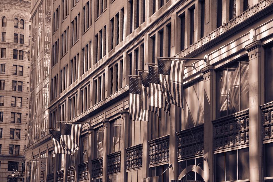 american flags on the building in new york