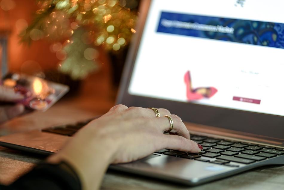 woman with laptop on blurred background