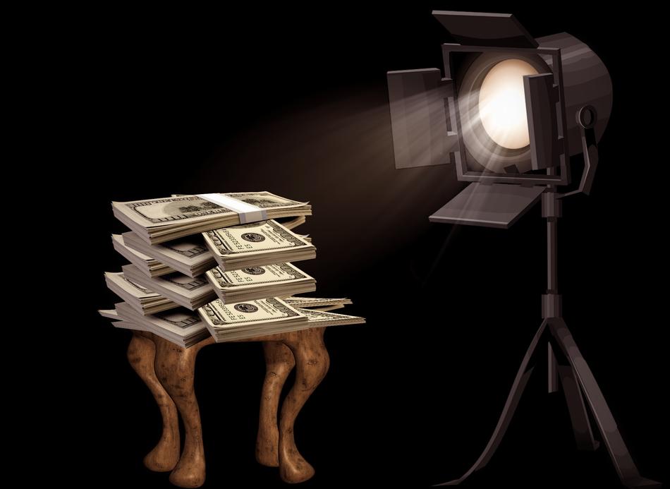 money on a chair near the lantern