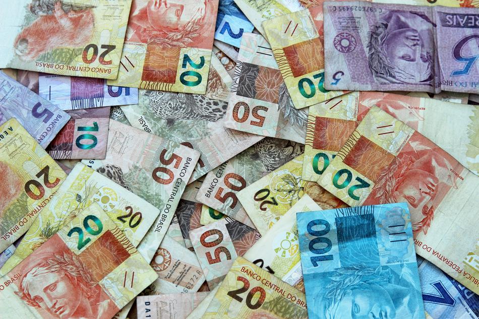 Colorful, Brazilian banknotes with the numbers and portraits, clipart