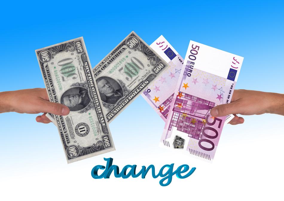 Changing colorful Dollar and Euro banknotes, in the hands, at blue and white, gradient background