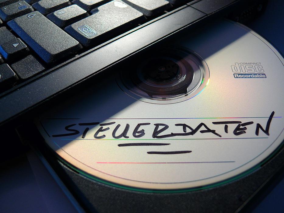 Shiny CD disk with tax data, in the cdrom