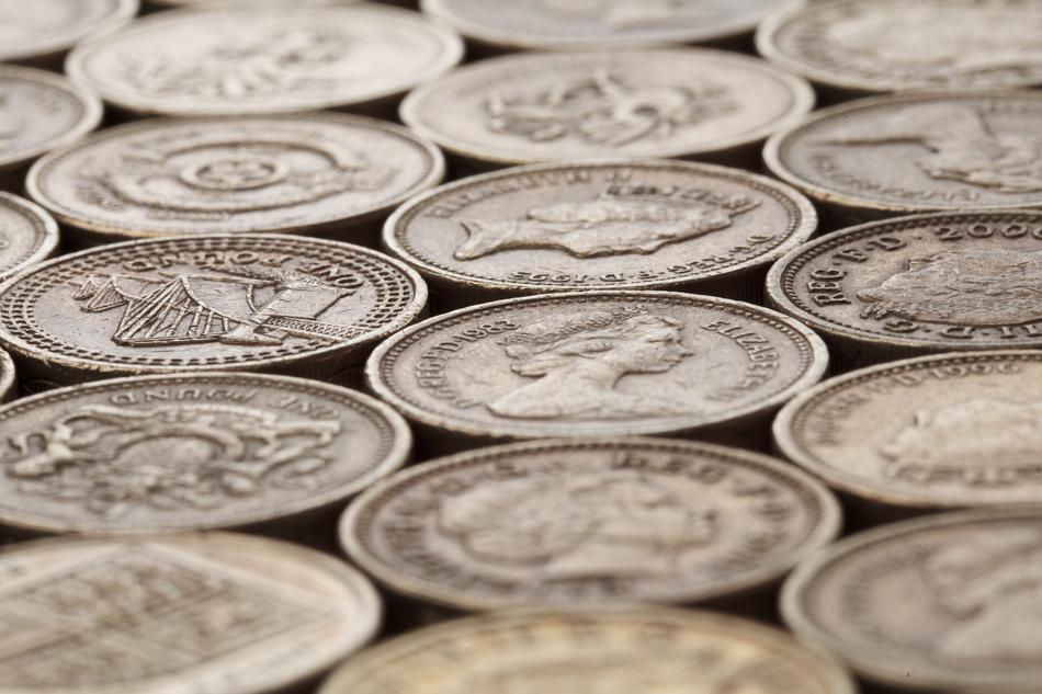 Top view of the beautiful, silver coins with patterns and images