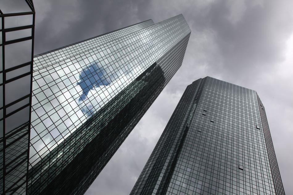 Shiny, glass skyscrapers, under the beautiful cloudy sky in Frankfurt, Germany