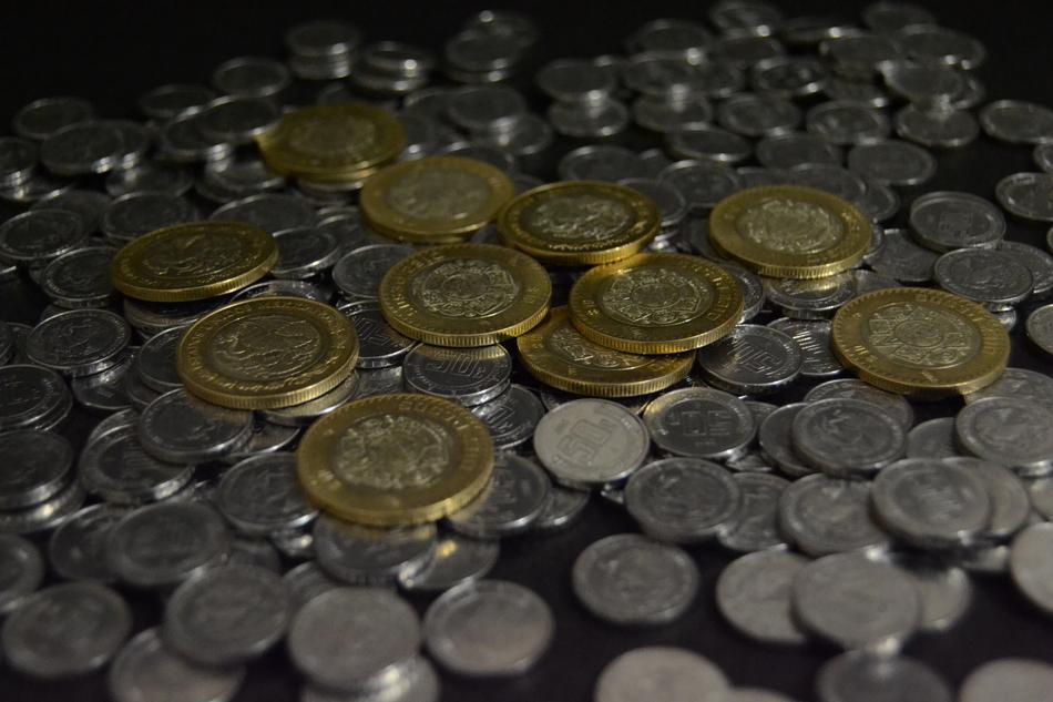 gold and silver coins on the table