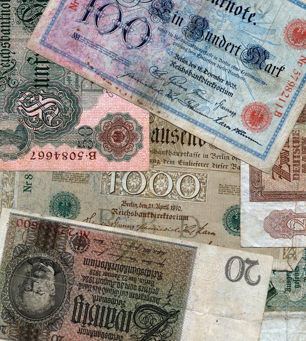 Close-up of the colorful banknotes with images, signs and numbers, clipart