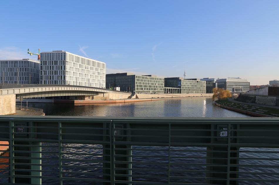 Cityscape of Berlin, Germany, with water in sunlight, among the buildings