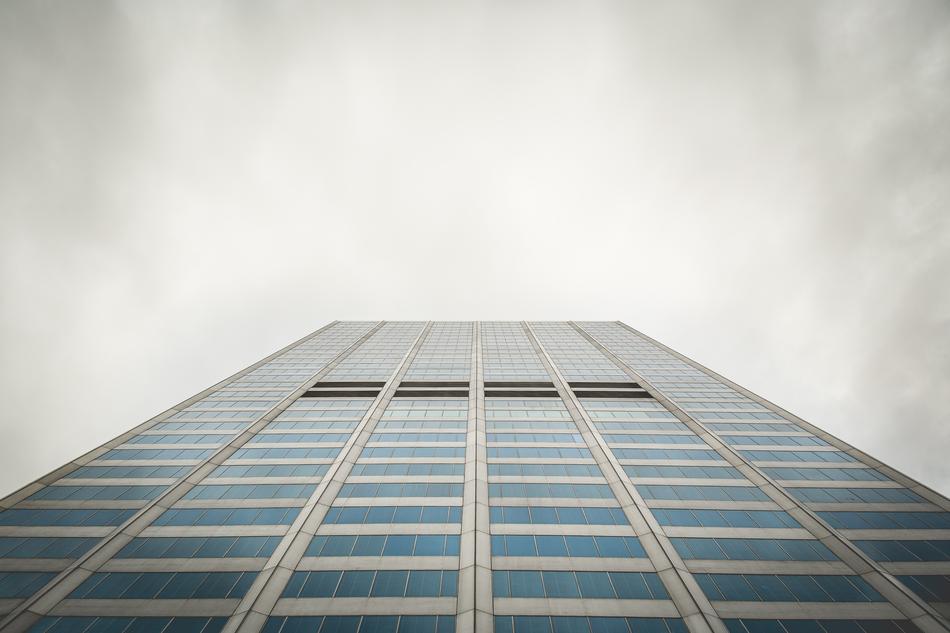 office building under gray clouds