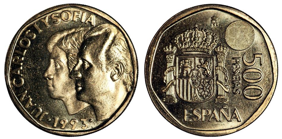 Spanish coins on white background