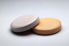 two vitamin tablets