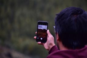 boy taking photo