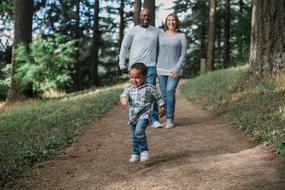 running boy on the forest path