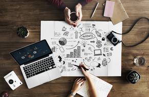 people discussing business plan at their desk