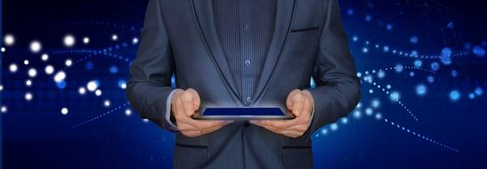 businessman holds tablet in hands