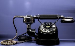 retro phone on the purple background