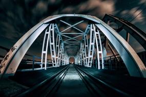 railway bridge in the dark at night