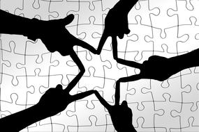 team making star with hands