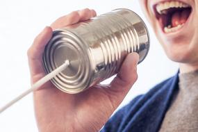 guy speaks in a tin can