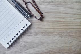 Notebook and Pen and glasses