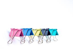 colored clips on a white background