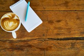 Coffee Latte Cappuccino on wooden table