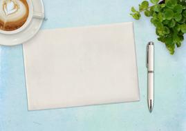 note pad pen coffee