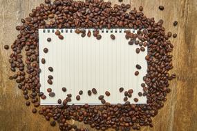 notebook and coffee beans