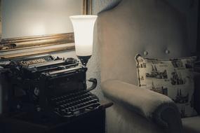 vintage typewriter and armchair