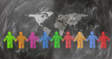 color illustration of people with world map on chalkboard