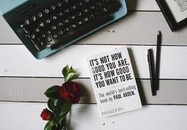 Book and Pencil and red Flower