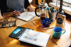 the artist at the table